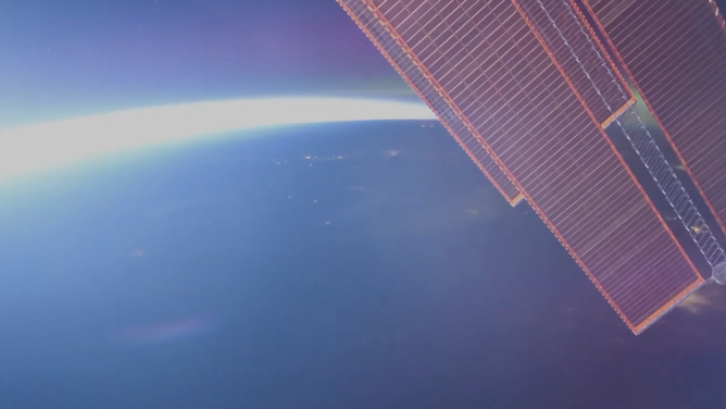 A screenshot of video taken by NASA astronaut Nichole Ayers shows Northern Lights over Earth as seen from space.
